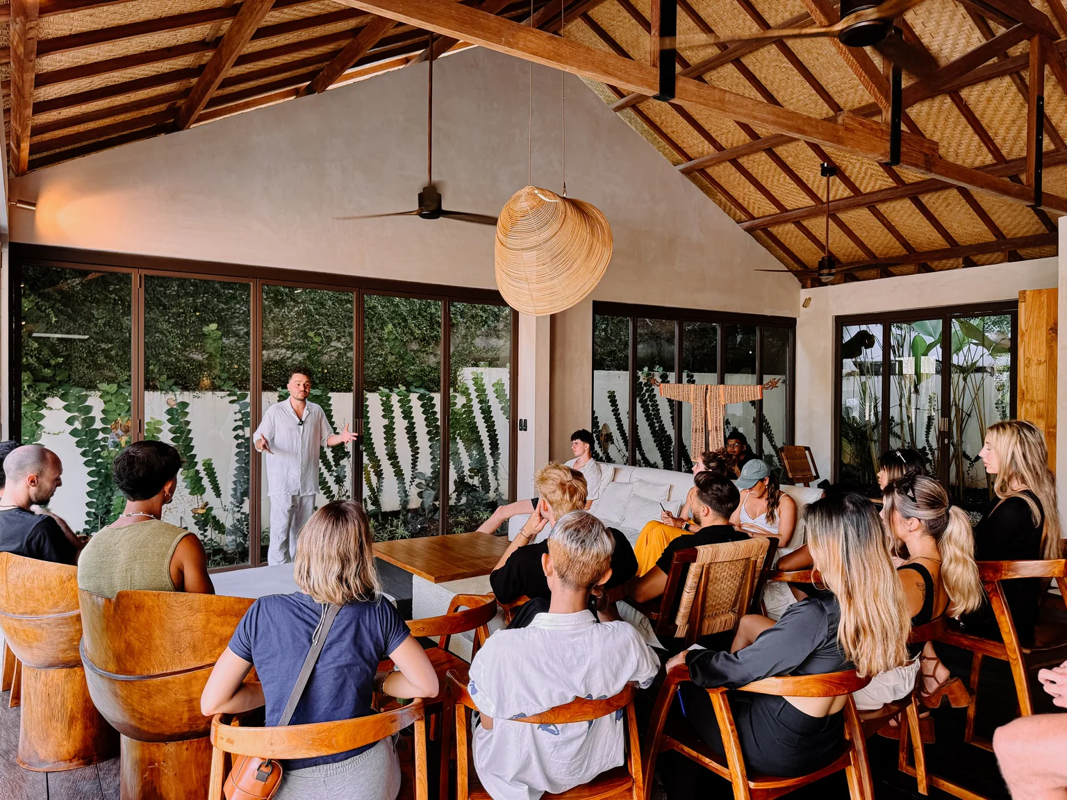 Sam teaching a live room of people